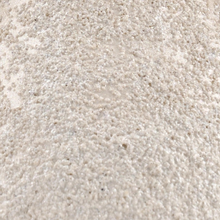 Load image into Gallery viewer, Close-up of beige carpet texture