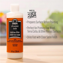 Load image into Gallery viewer, FolkArt all-purpose sealer bottle with product details on a blurred background