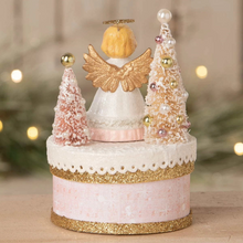 Load image into Gallery viewer, Decorative angel figure with trees on a blurred festive background
