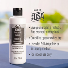 Load image into Gallery viewer, FolkArt fine crackle medium bottle with product details on a blurred background