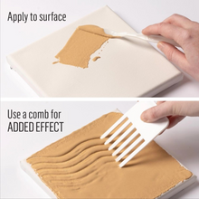 Load image into Gallery viewer, Hand applying brown substance to a surface with a comb for added effect