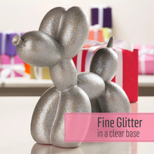 Load image into Gallery viewer, Silver glitter balloon sculpture of a dog with a pink label on a blurred background
