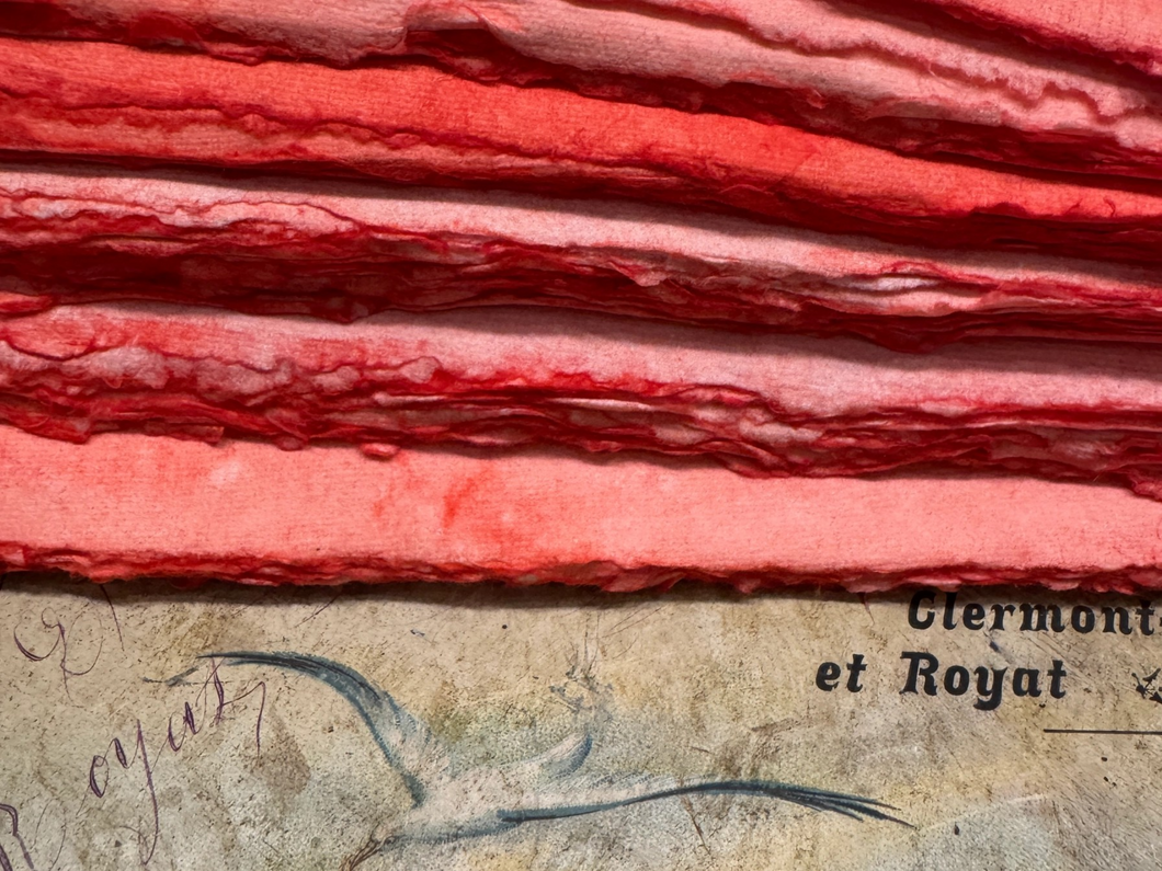 Handmade Deckled Edge Reddish Colored Paper Bundles by Monahan Papers