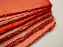 Load image into Gallery viewer, Handmade Deckled Edge Reddish Colored Paper Bundles by Monahan Papers