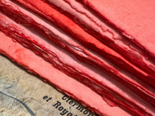 Load image into Gallery viewer, Handmade Deckled Edge Reddish Colored Paper Bundles by Monahan Papers