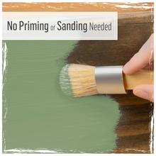 Load image into Gallery viewer, Person painting a wooden surface green with a brush, text 'No Priming or Sanding Needed' above.