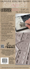 Load image into Gallery viewer, Back cover of the Iron Orchid Designs 'With the Iod Family' Jod Moulds book, featuring product information, website details, and a photo of a hand holding a cast replica of the Iod Orchid flower.
