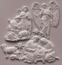 Load image into Gallery viewer, White relief wall art depicting the Holy Family, angels, and sheep on a textured light gray background.