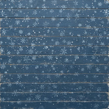 Load image into Gallery viewer, A square decorative panel featuring horizontal dark blue wooden planks with a distressed finish, decorated with hand-painted white snowflakes and snowflurries across the surface.