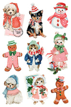 Load image into Gallery viewer, A sheet of vintage-style Christmas animal illustrations on a white background, featuring a puppy in a Santa hat and scarf, a black-and-tan dog with a red striped hat and scarf, a snowman in a red hat and scarf, a gingerbread man in a green hat and bow tie, a cat in a blue coat and red scarf, a cat in a pink winter outfit with holly, a fluffy white puppy in a blue hat and scarf, a cat in a pink hood with red trim, and a gingerbread man in a red hat and bow tie.
