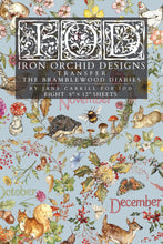 Load image into Gallery viewer, A flat lay of a transfer paper sheet featuring autumn and woodland illustrations, labeled 'IOD Iron Orchid Designs Transfer The Bramblewood Diaries' with months October, November, and December visible.