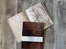 Load image into Gallery viewer, Another view of Roycycled Treausres Journal opened and cover of journal