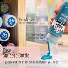 Load image into Gallery viewer, Blue paint bottle with text on a blurred background of paint containers