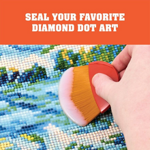 Load image into Gallery viewer, Hand using a Mod Podge Small Decoupage Brush to seal diamond dot art with text 'Seal Your Favorite Diamond Dot Art' on an orange background