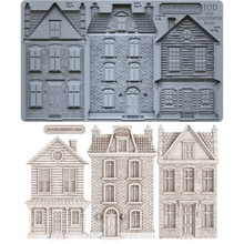 Load image into Gallery viewer, A set of miniature Victorian-style house molds and cutouts, including a gray metal mold tray at the top and three finished light beige house cutouts below on a white background.