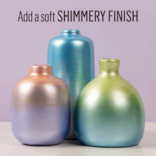 Load image into Gallery viewer, Three metallic vases in blue, gold, and green on a light purple background with text 'Add a soft shimmery finish'.