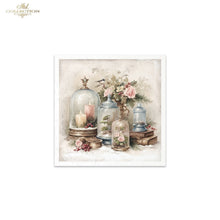 Load image into Gallery viewer, A square framed art print featuring a vintage still life illustration with glass cloches, candles, flowers, and small books in soft pastel tones. The print is centered on a white background, with a small 'Ash Collection' logo in the top-left corner.
