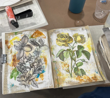 Load image into Gallery viewer, Roycycled Art Journal showing pages of watercolor paitned florals