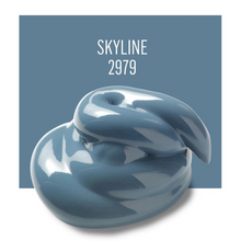 Load image into Gallery viewer, Blue ceramic sculpture with 'SKYLINE 2979' text on a blue background