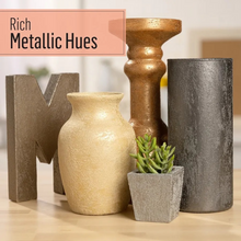Load image into Gallery viewer, Decorative items with metallic and textured finishes on a wooden surface.