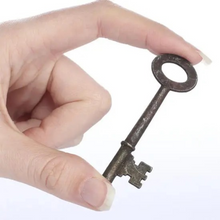 Load image into Gallery viewer, Vintage Look Rusted Metal Oval Skeleton Key