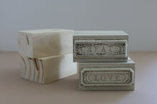 Load image into Gallery viewer, Four decorative rectangular boxes with rounded corners on a beige surface against a light gray background. Two boxes are unfinished light wood with visible grain, and two are painted in a distressed off-white finish with embossed labels reading CREATE and LOVE.