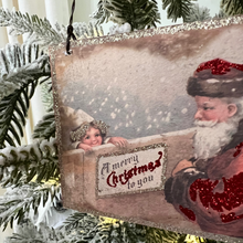 Load image into Gallery viewer, Closeup of Santa with Merry Christmas Sign